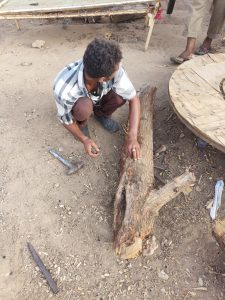 Cutting down trees to make fire